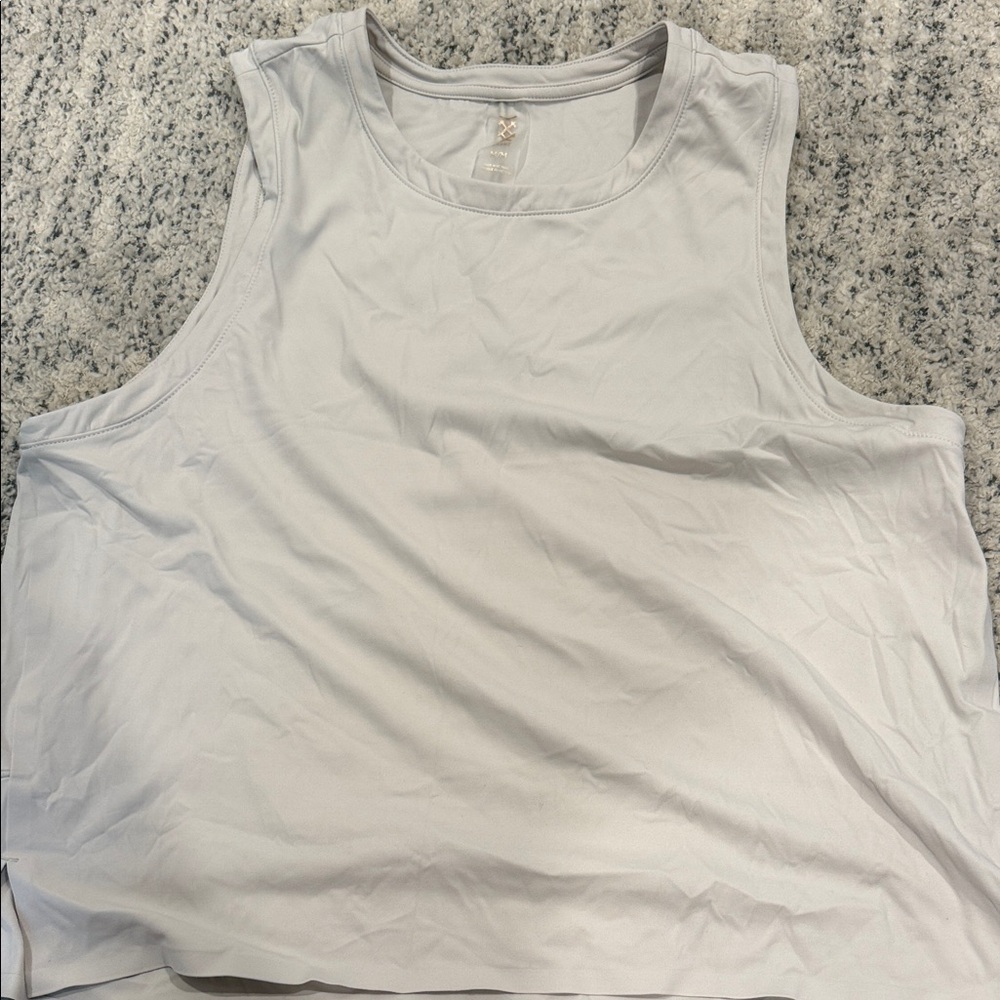 Rhone cream muscle tank workout top